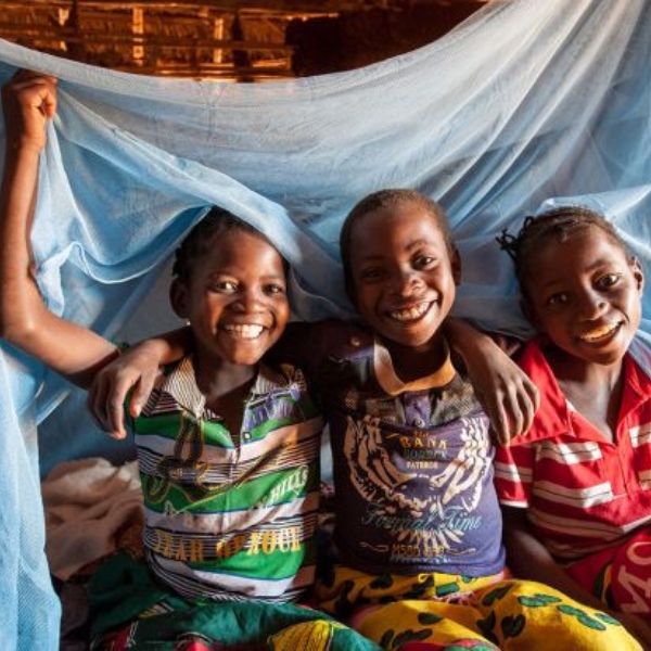 Block Malaria project children shielding from malaria
